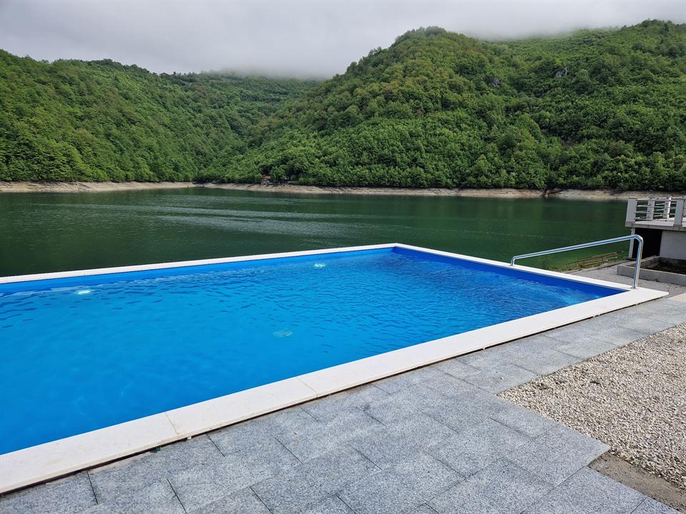 Infinity-style pool at Happyland overlooking Jablanica Lake
