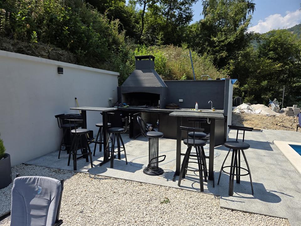 Outdoor bar and grill station at Happyland