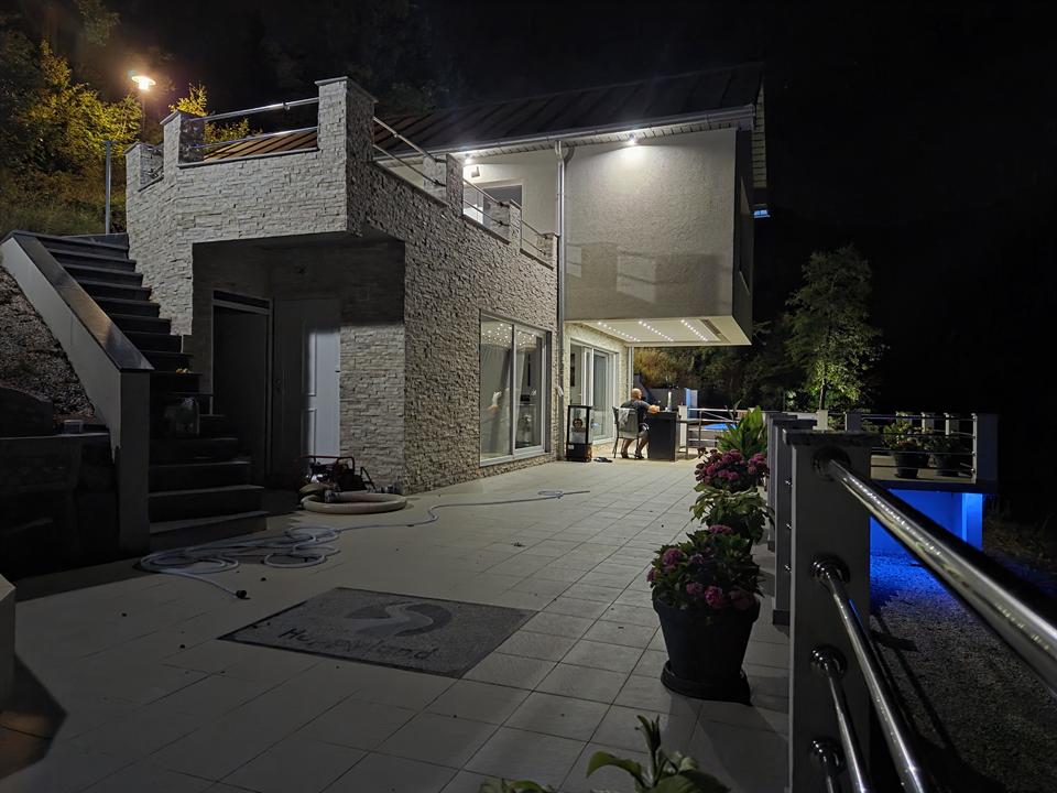 Happyland house and terrace at night